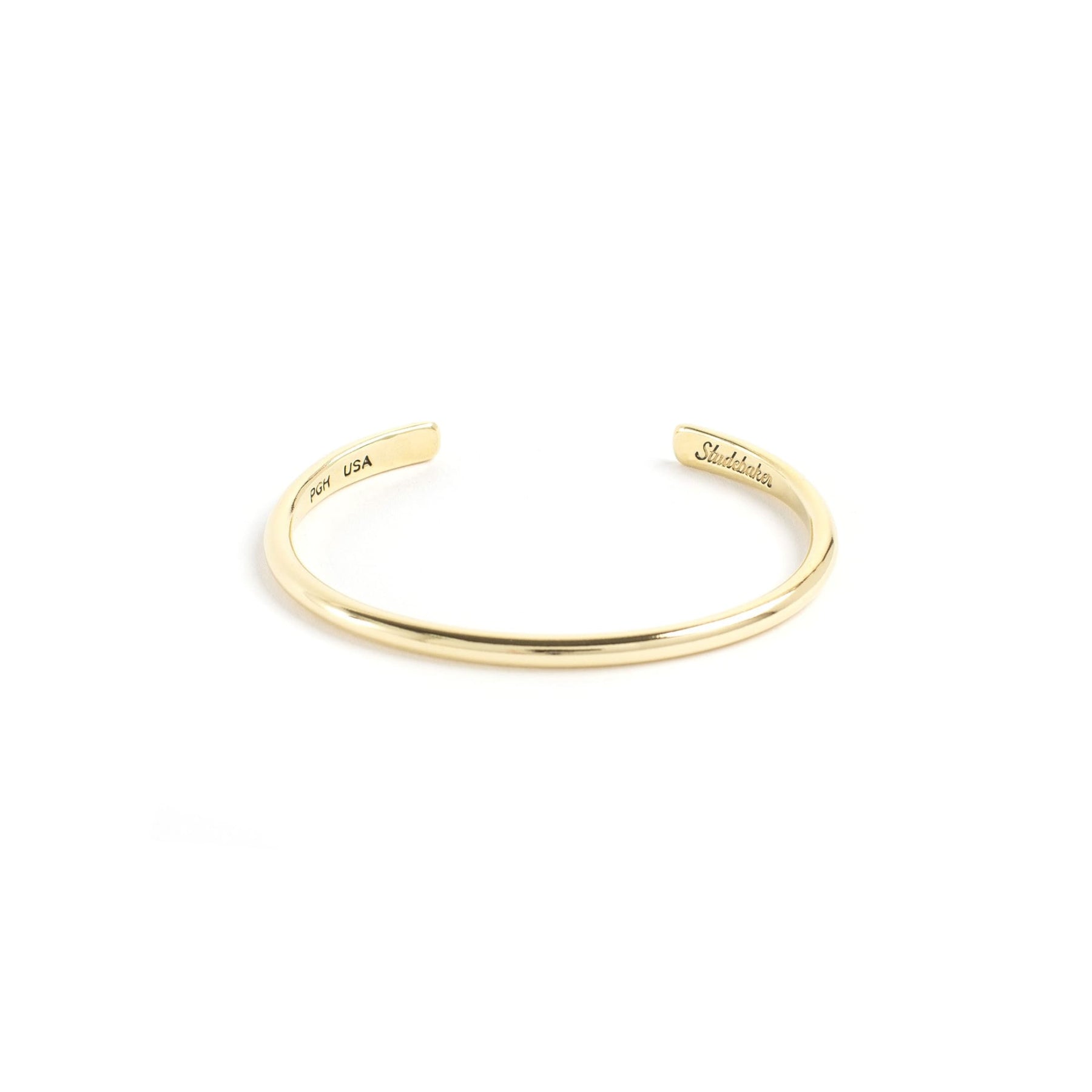 https://studebakermetals.com/cdn/shop/products/champion-cuff-small-brass-polished-cuffs-bracelets-646_1800x1800.jpg?v=1596935840